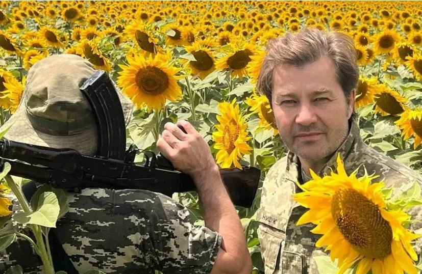 Євген Нищук.